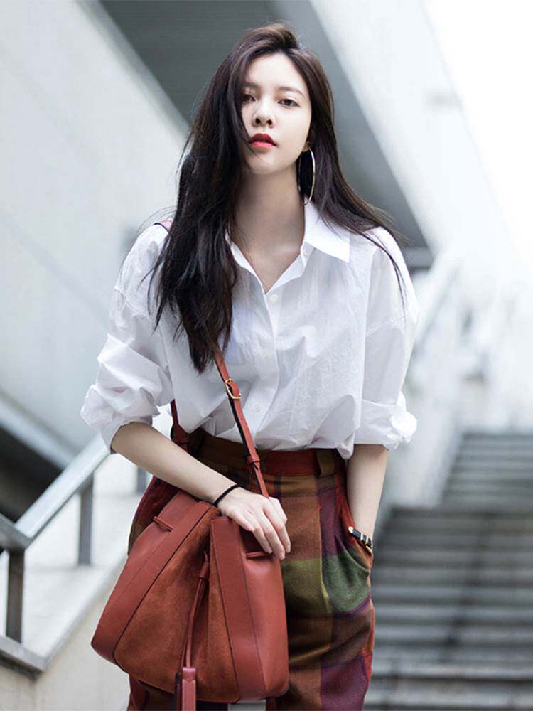 御姐风白色衬衣高级感衬衫早秋女装2023新款小众气质时尚法式上衣属于什么档次？