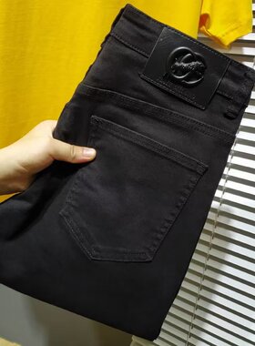 欧洲站高端黑色牛仔裤男士2023新款修身小脚潮牌弹力春秋季长裤子