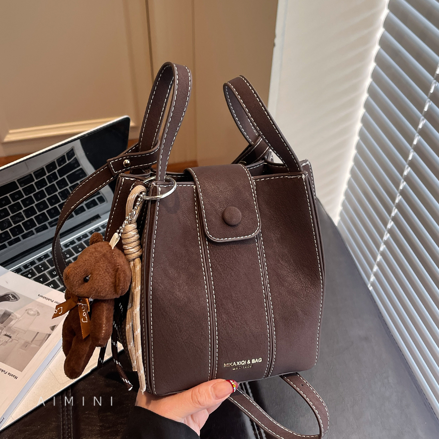 小众复古拼接水桶包女手提斜挎包