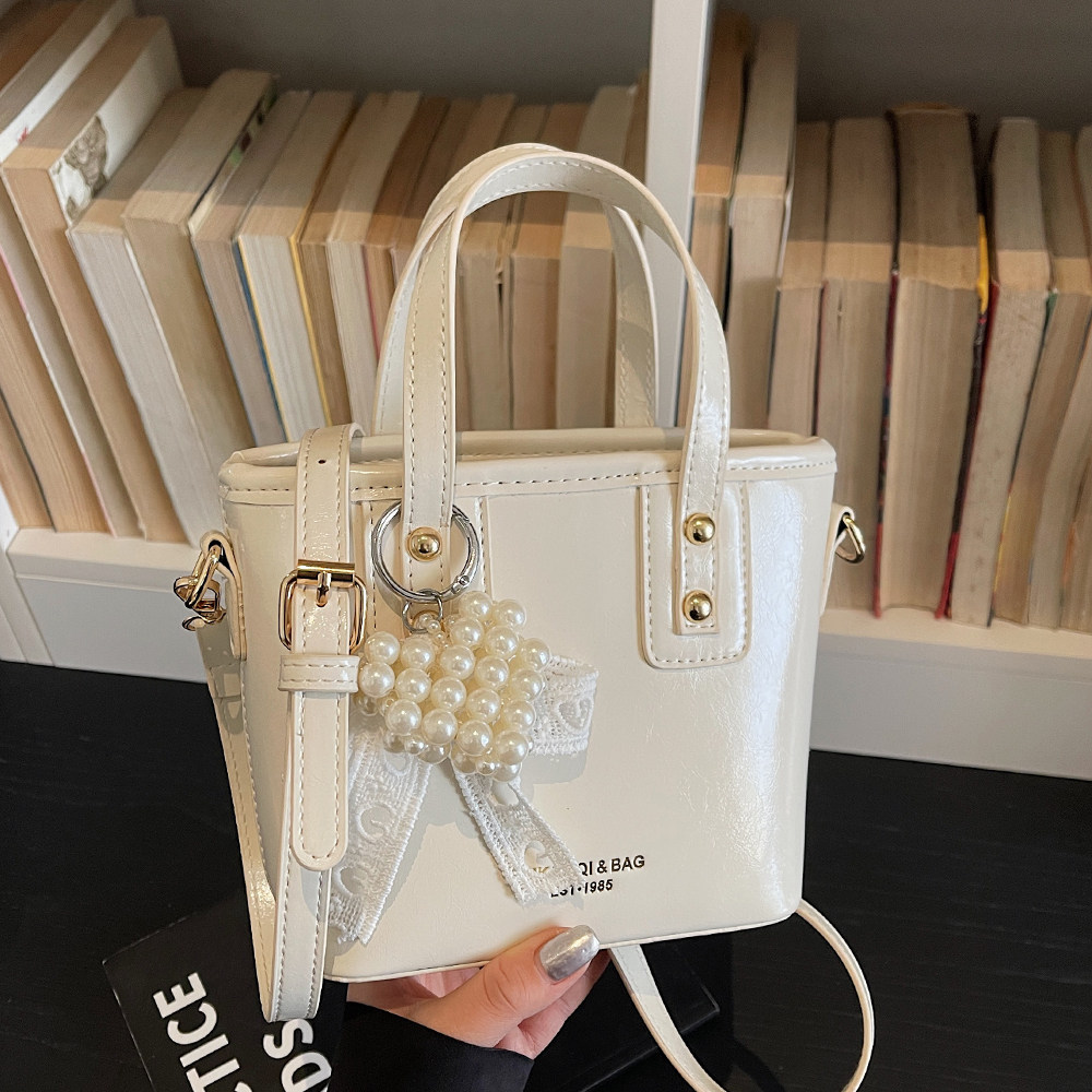 高级感水桶包女手提小拎包2026春季新款时尚百搭日常通勤斜挎包,箱包皮具/热销女包/男包,水桶包,淘宝优惠券,粉丝福利购,淘宝优惠卷