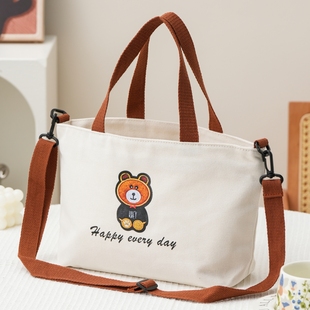 新款时尚手提包上班杂物手拎包通勤上学饭盒袋外出单肩斜挎帆布包