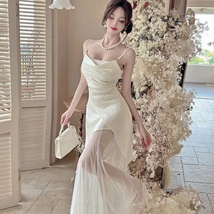 實拍超仙海邊度假吊帶連衣裙不規則長裙子女高級感收腰顯瘦長裙