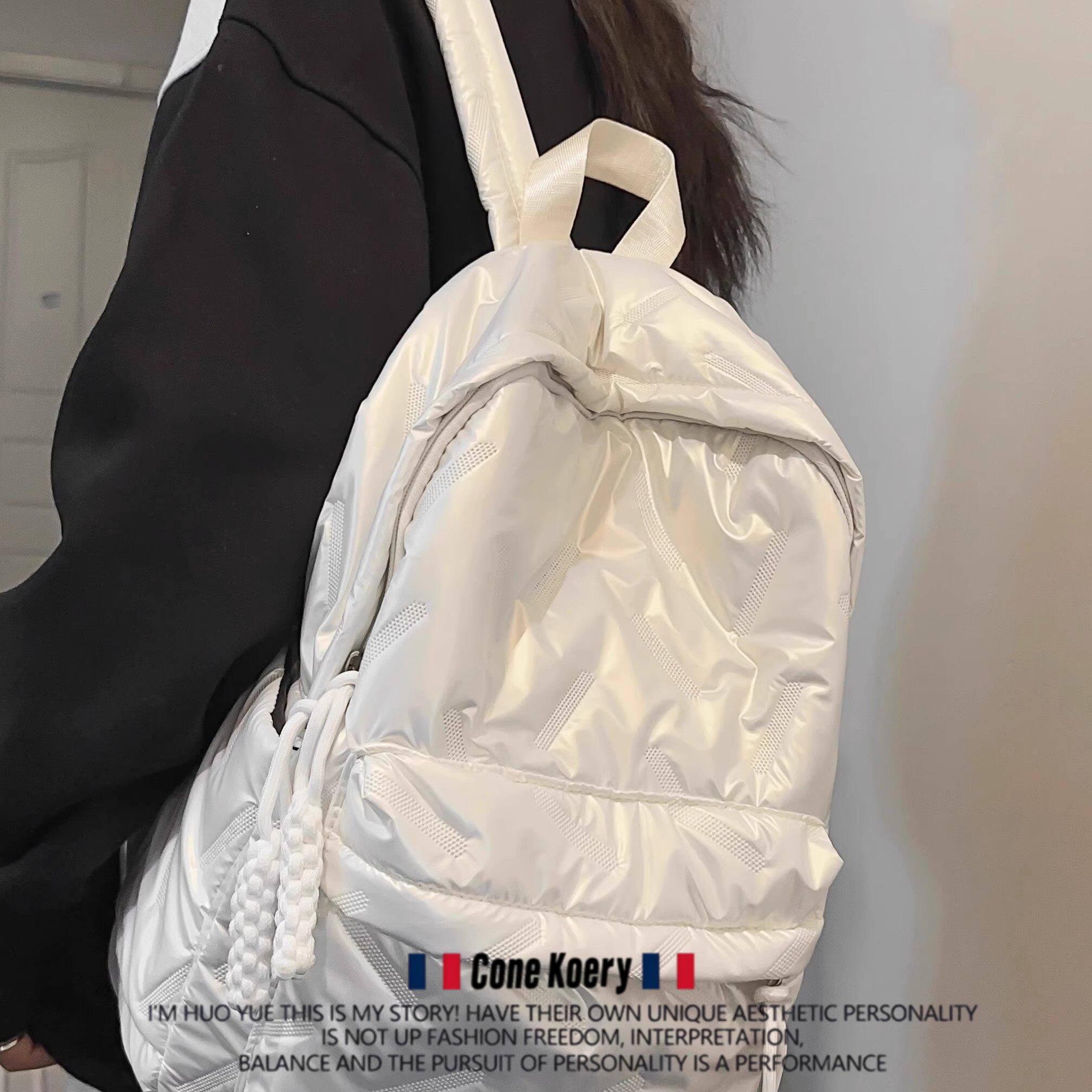 法国羽绒棉服包双肩包男女学生上课通勤包背包大容量电脑包旅行包