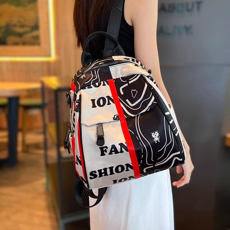 代购印花时尚牛津布双肩包2026新款潮个性百搭单肩轻便背包女士包