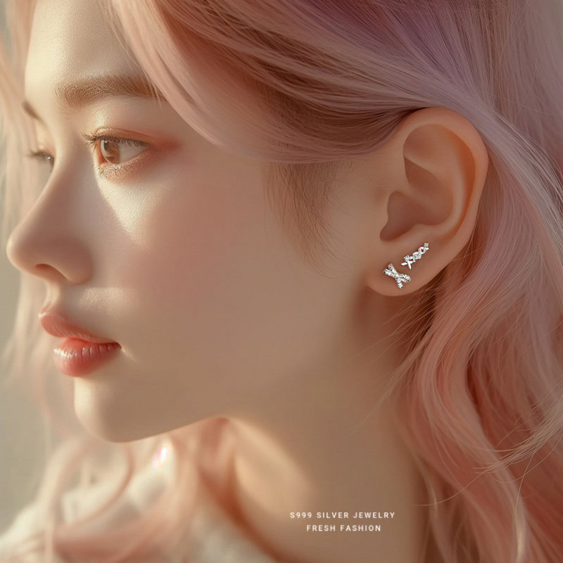 s999足银蝴蝶结不对称耳钉女新款纯银时尚百搭轻奢锆石高级感耳饰