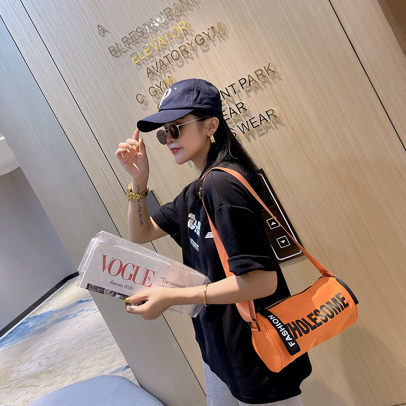 香港IT.greg牛津布女包新款百搭小众运动单肩斜挎包水桶包圆筒包