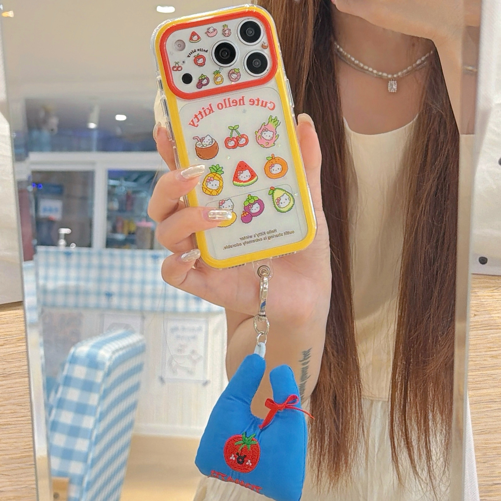 日本HelloKitty水果大头造型适用苹果17promax手机壳15全包按键镜头壳14/13创意可爱蓝色包包挂绳16防摔保护