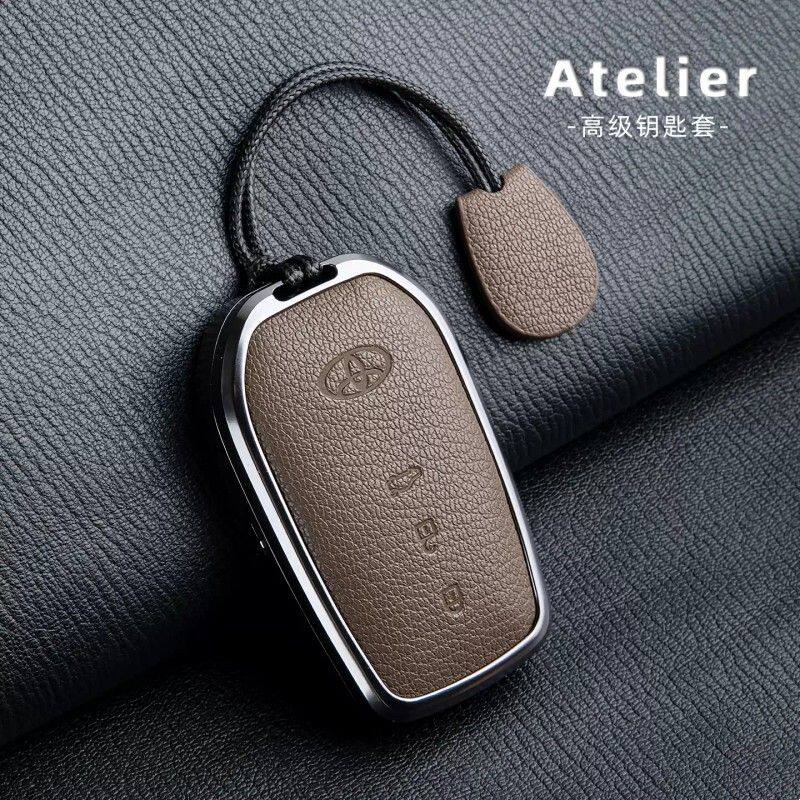 适用丰田钥匙套亚洲龙锐放霸道普拉多凯美瑞汉兰达真皮包扣壳高级
