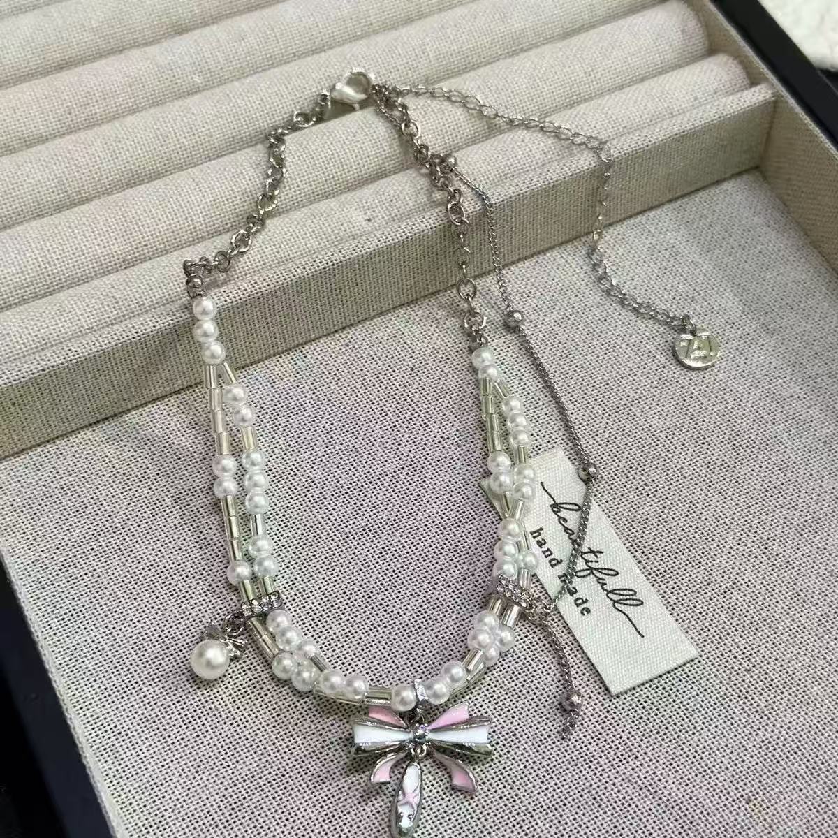 甜美少女串珠粉色蝴蝶结芭蕾舞鞋吊坠项链女轻奢高级感锁骨链颈链
