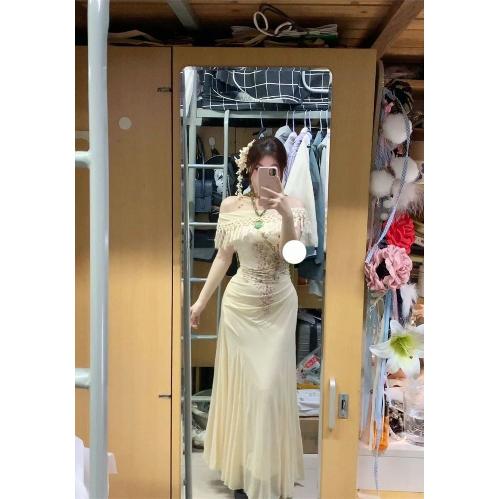 微胖温柔优雅气质碎花包臀长款鱼尾裙新款时尚高级轻奢流苏连衣裙