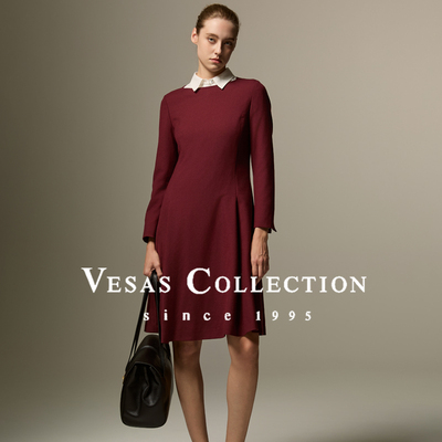 连衣裙中长款羊毛纯色压褶