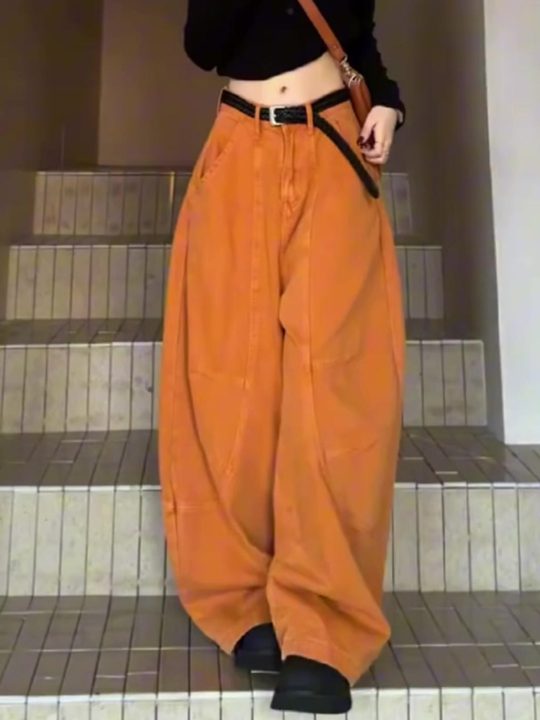 琥珀流光橘黄色弯刀牛仔裤女2025年秋季新款高腰显瘦宽松阔腿长裤