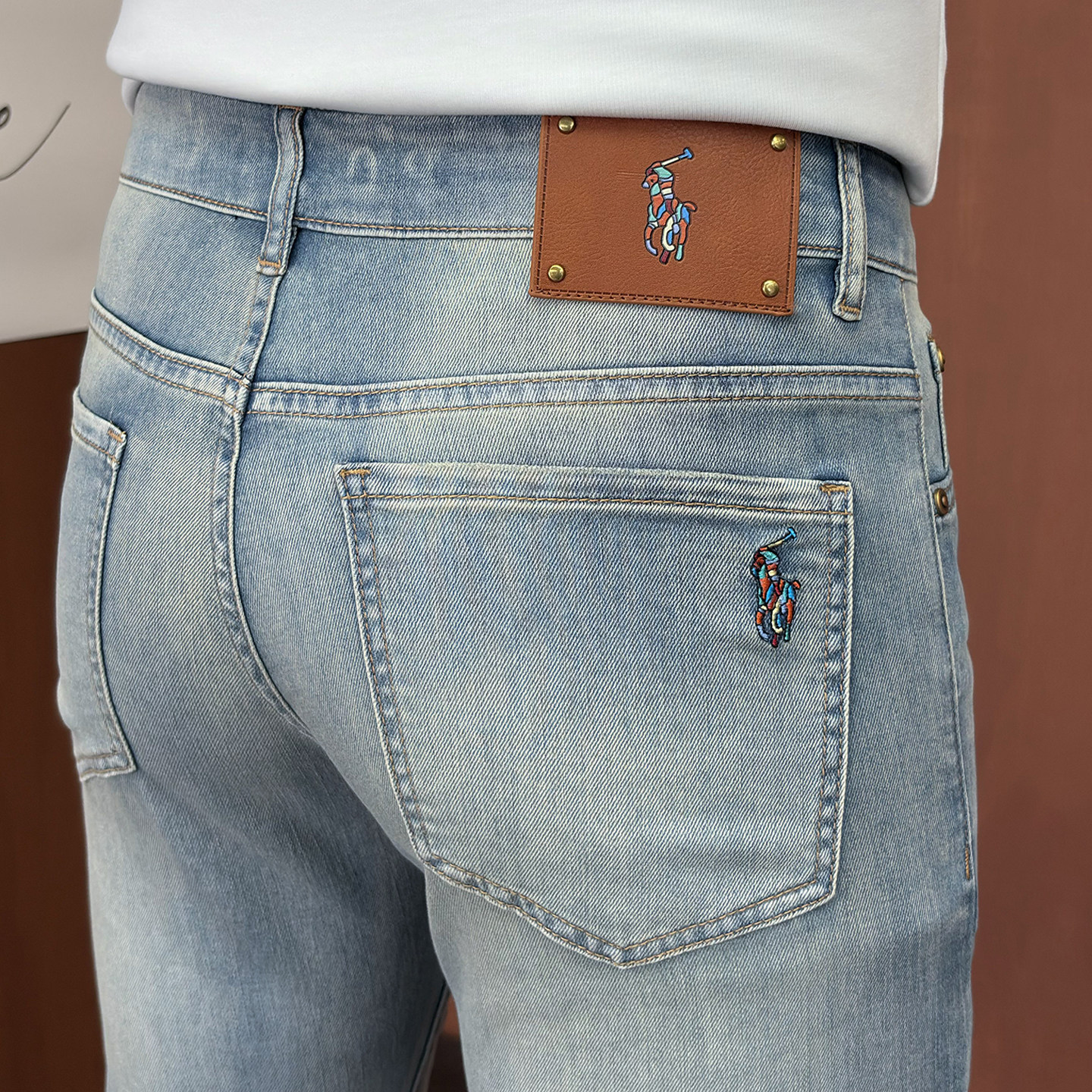 意大利高端品牌浅蓝色牛仔裤男2026新款修身小脚弹力潮流春夏裤子