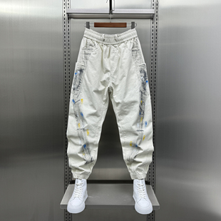 男士秋季裤子潮流百搭宽松个性泼墨休闲裤痞帅高街工装束脚弯刀裤