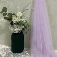In the art area of the kindergarten, the purple-themed circular creative gauze curtains are arranged. The corners of the classroom areas are decorated with laser glass gauze materials thumbnail 2