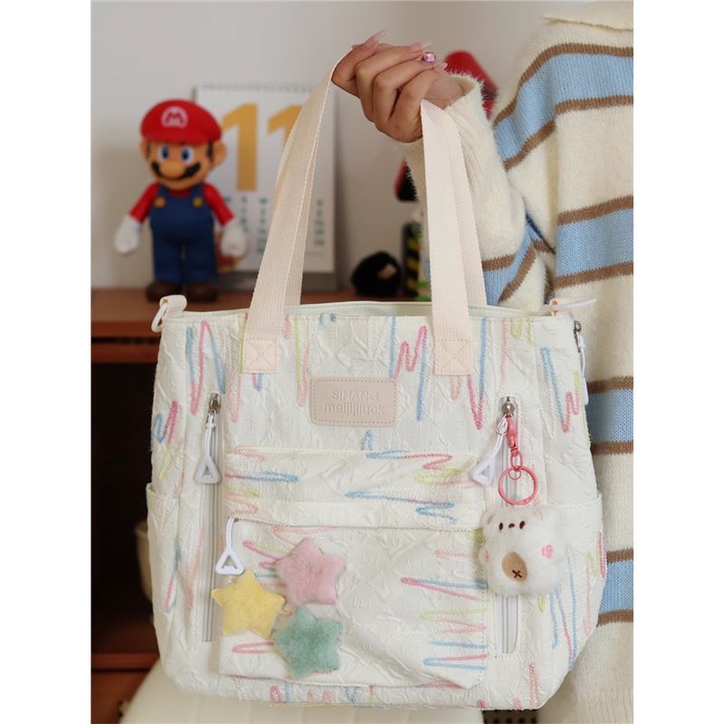 可爱初中生手提袋拎书袋高颜值补习袋学生通勤包大容量女生斜挎包