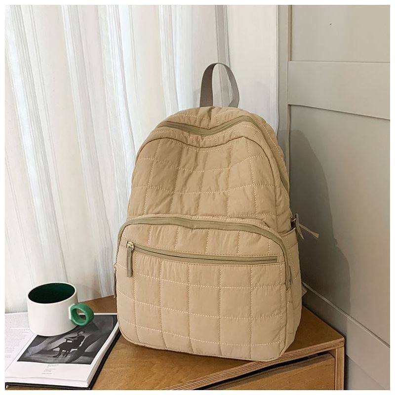 通勤背包男生小众时尚潮流简约户外轻便双肩包男小型大学生书包女