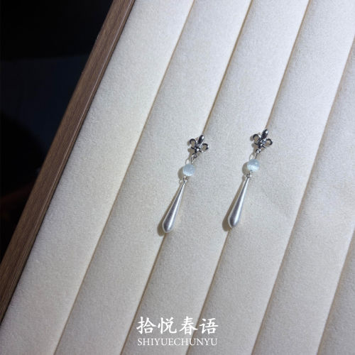 S925纯银鸢尾花银色水滴耳环2026
