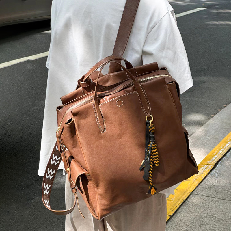 高级感油蜡皮质旅行通勤双肩包女士2025秋季新款小众设计休闲背包