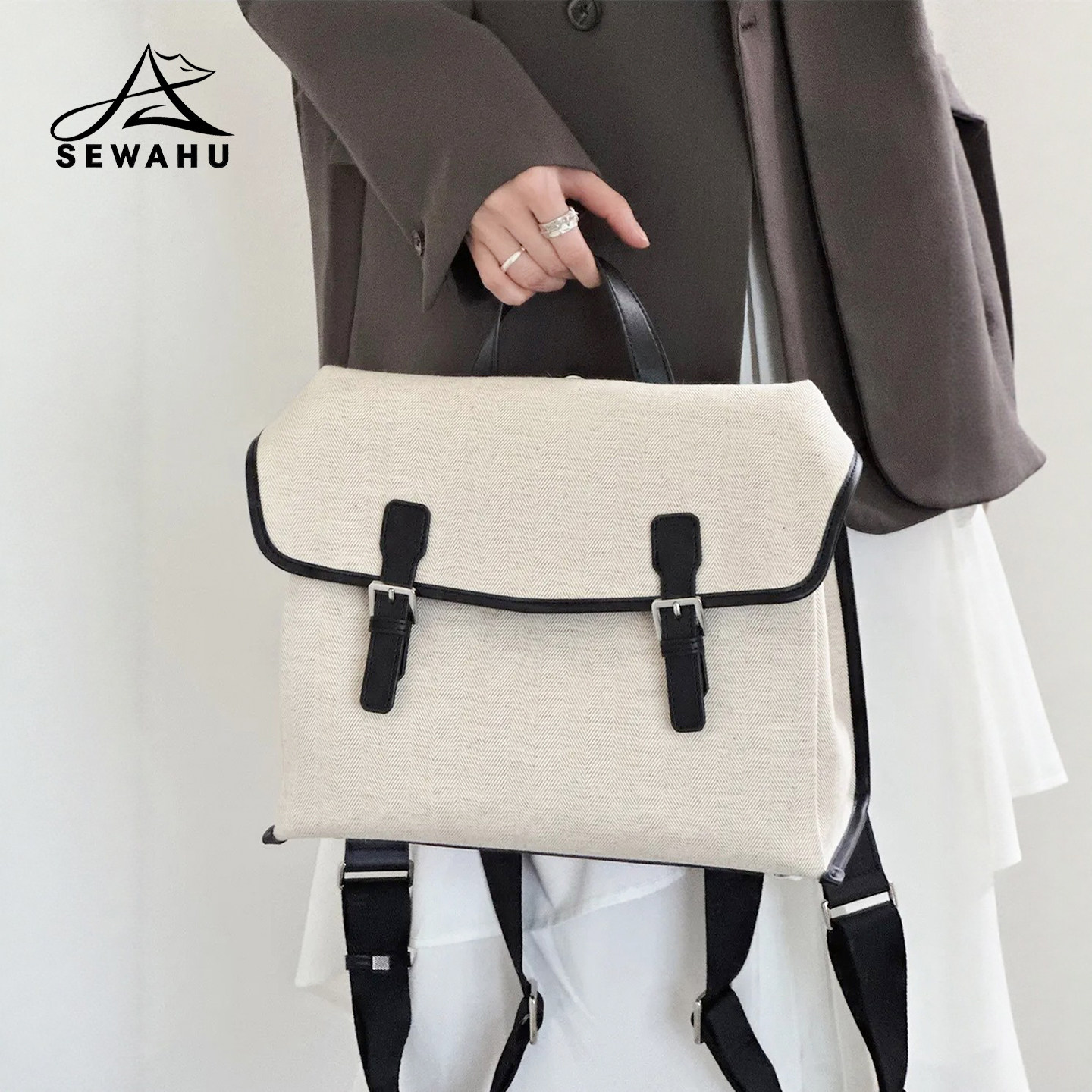 上班通勤小众女双肩包不撞款高级感斜挎邮差包大容量皮质电脑背包