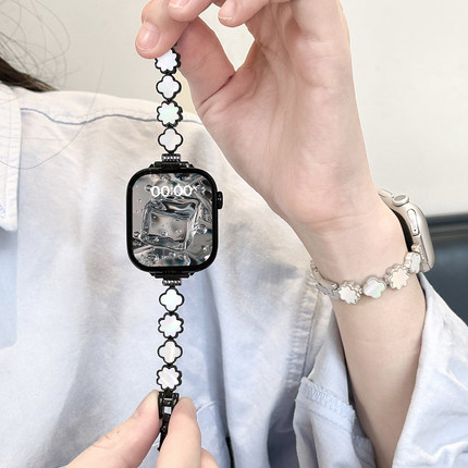 适用applewatchS11四叶草镶钻贝母表带iWatch10/9小香风镭射金属表带苹果手表8/7/6不锈钢细款SE手链表带女夏