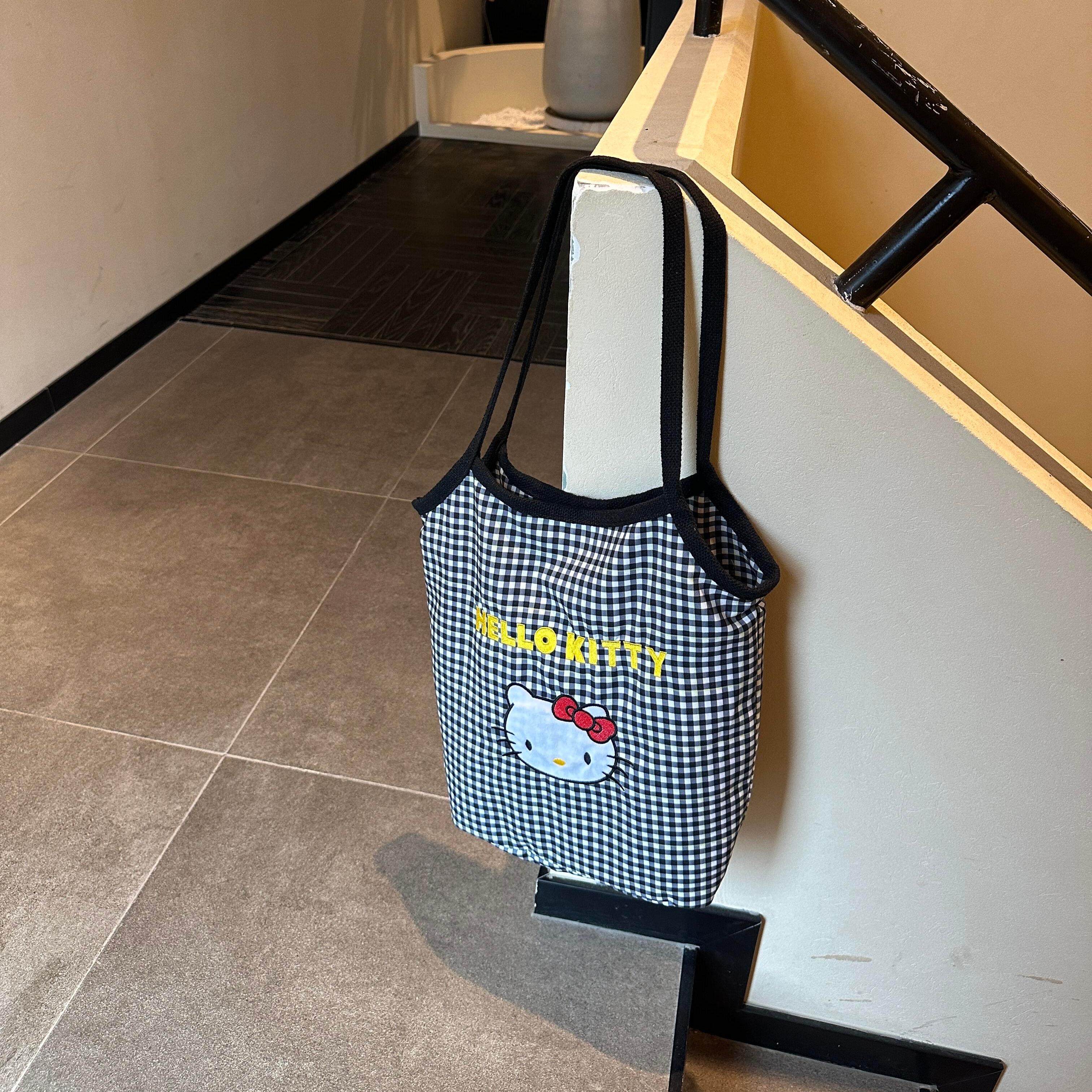 哈喽kt包包帆布包单肩手提包女款日常通勤百搭秋冬背2025超火精致