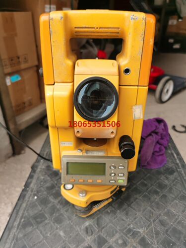 拓普康GTS-311全站仪当配件处理自己找了一个充电器开