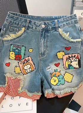 大码胖mm减龄百搭不规则卡通印花牛仔短裤蓝色格子拼接毛边裤子女