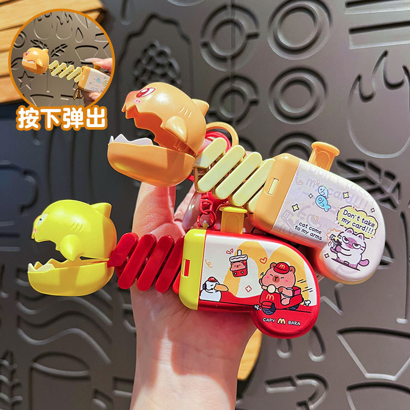 创意伸缩鲨鱼枪钥匙扣可爱卡通趣图片