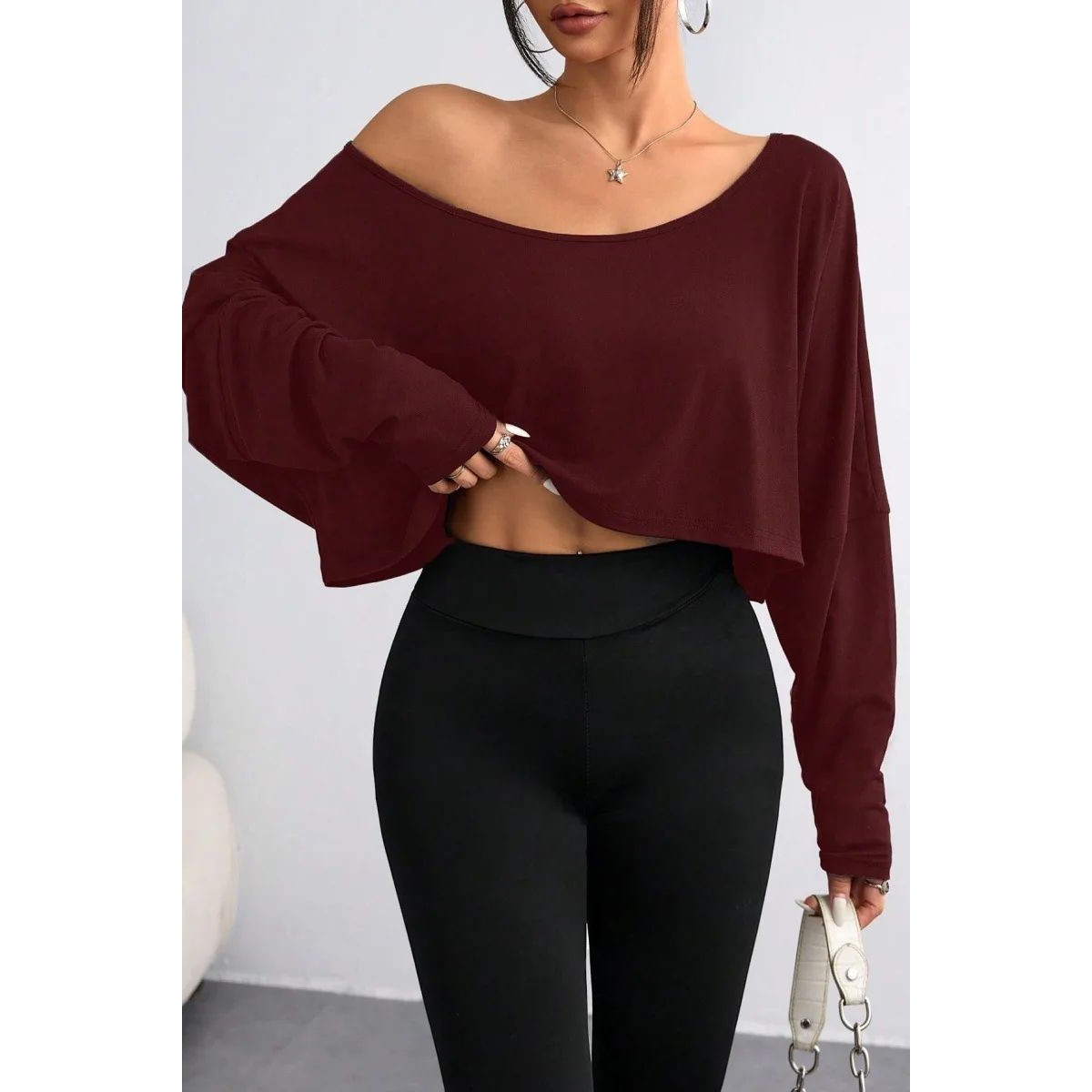 纯色一字肩露腰上衣 Solid color one shoulder open waisted top