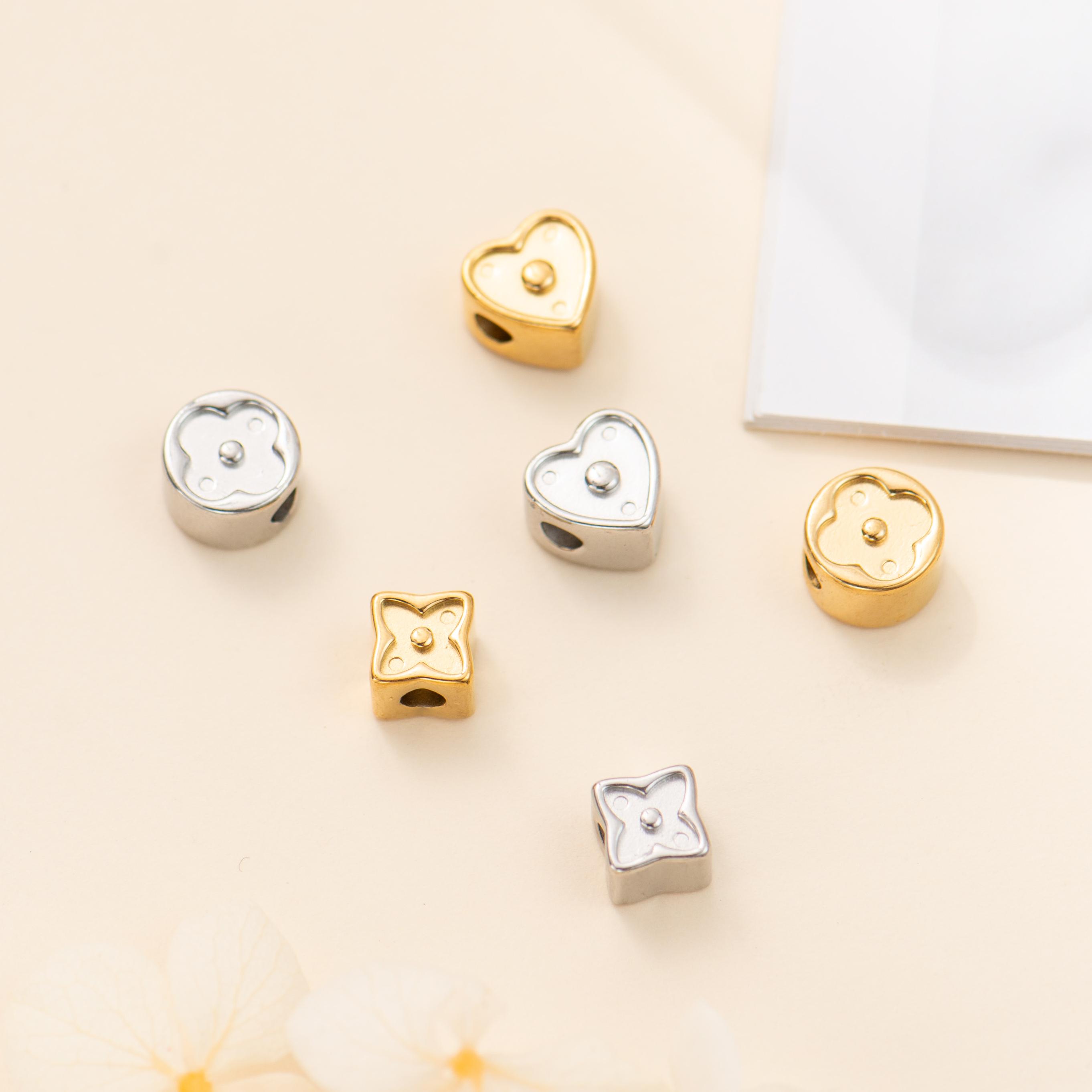 钛钢电镀18K爱心隔珠四叶草