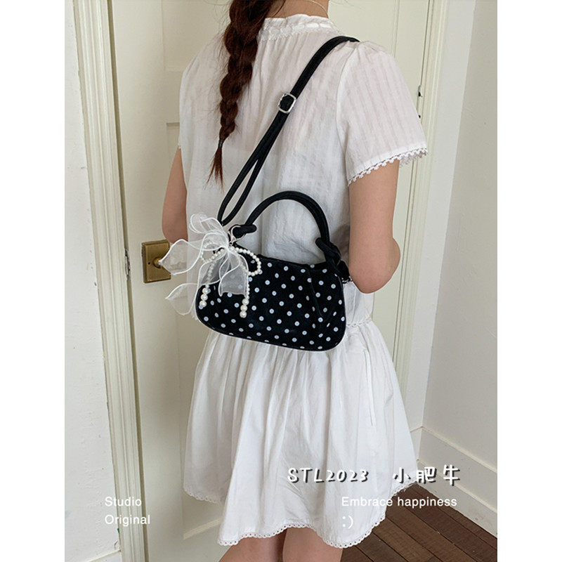 日韩风蝴蝶结波点腋下包包女2026新款小众新月形高级感单肩斜挎包