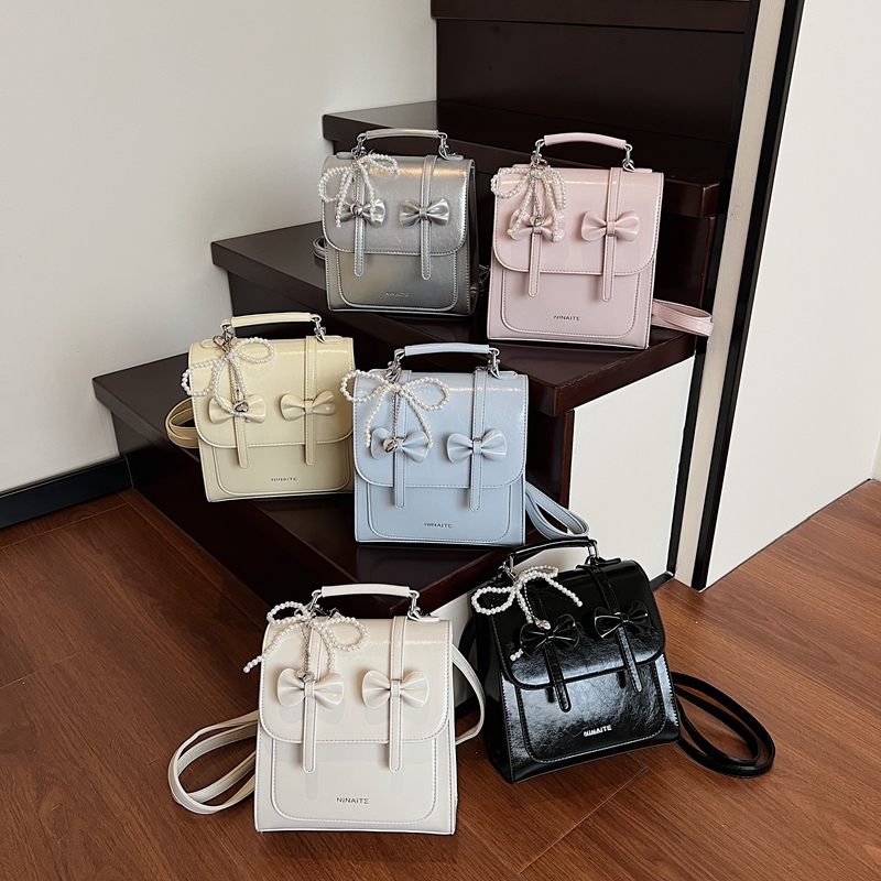 韩系复古百搭学院风手提双肩包包女2025夏季大学生百搭休闲小背包