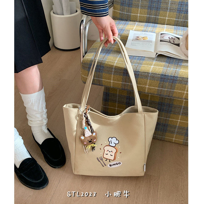 韩系大容量帆布托特包包女小众学院风单肩包大容量百搭上课通勤包,箱包皮具/热销女包/男包,通用款女包,淘宝优惠券,粉丝福利购,淘宝优惠卷