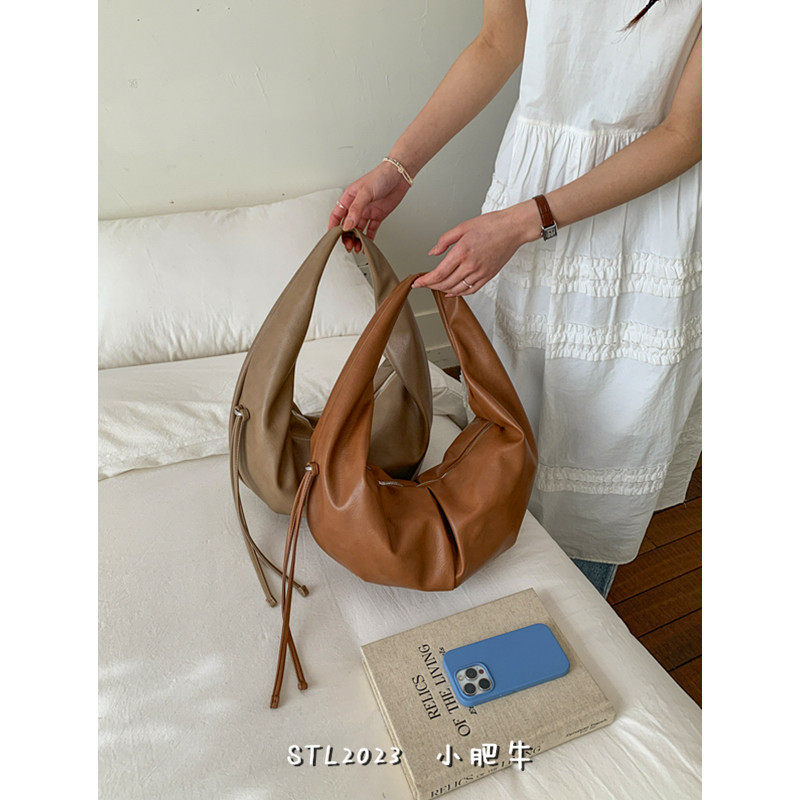 韩版复古褶皱饺子包包女2026春季新款高级感单肩腋下包时尚手提包