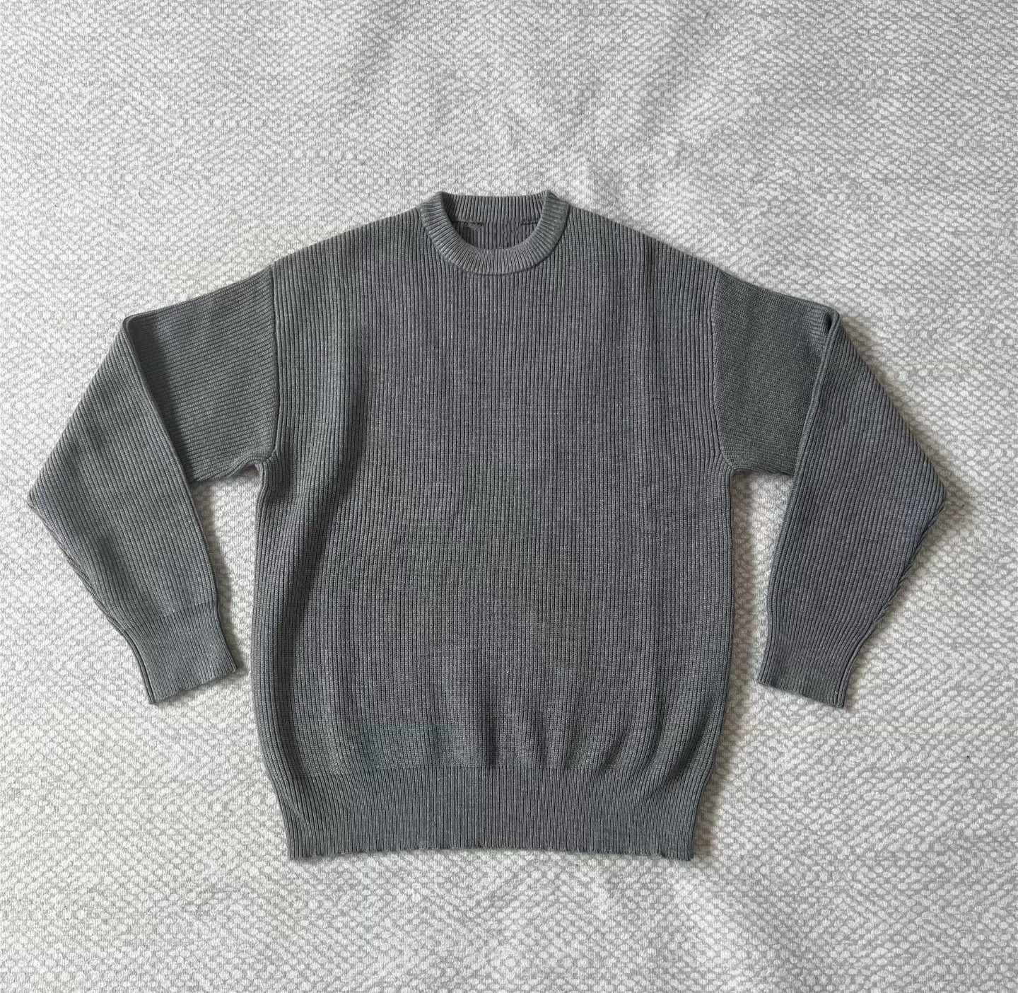 thumbnail for CC's new dark grey monogram sweater