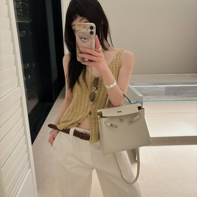 VERSO-26夏上新镂空针织排扣背心(不含眼镜+下装)SW60009