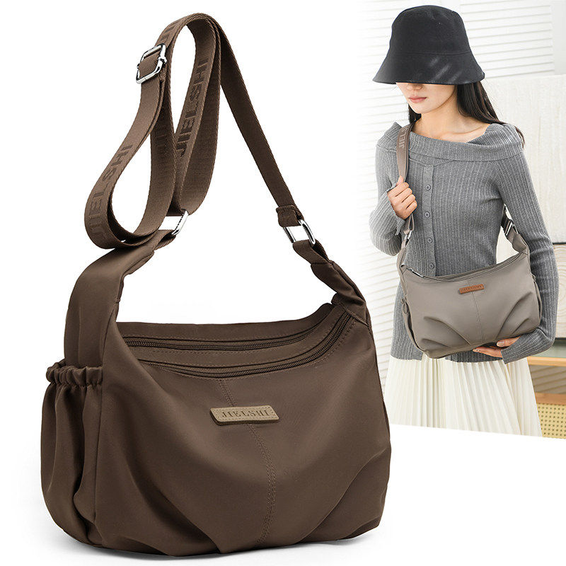 牛津布斜挎包女2025新款包包大容量多隔层休闲单肩小包时尚帆布包