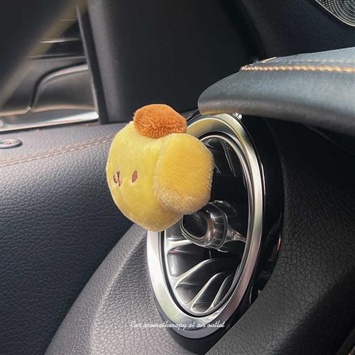 车载香氛汽车空调出风口香薰布丁狗头公仔女士高档车内空装饰摆件