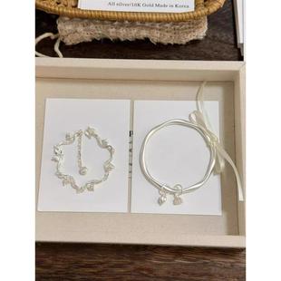 冷淡风叠戴铃兰花吊坠手链女哑光缎感莫比乌斯麻花手镯手饰高级感