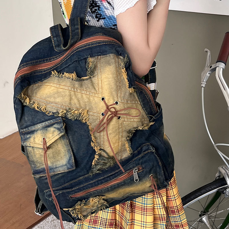 牛仔双肩包女大学生书包新款时尚百搭通勤旅行旅游大容量牛仔背包