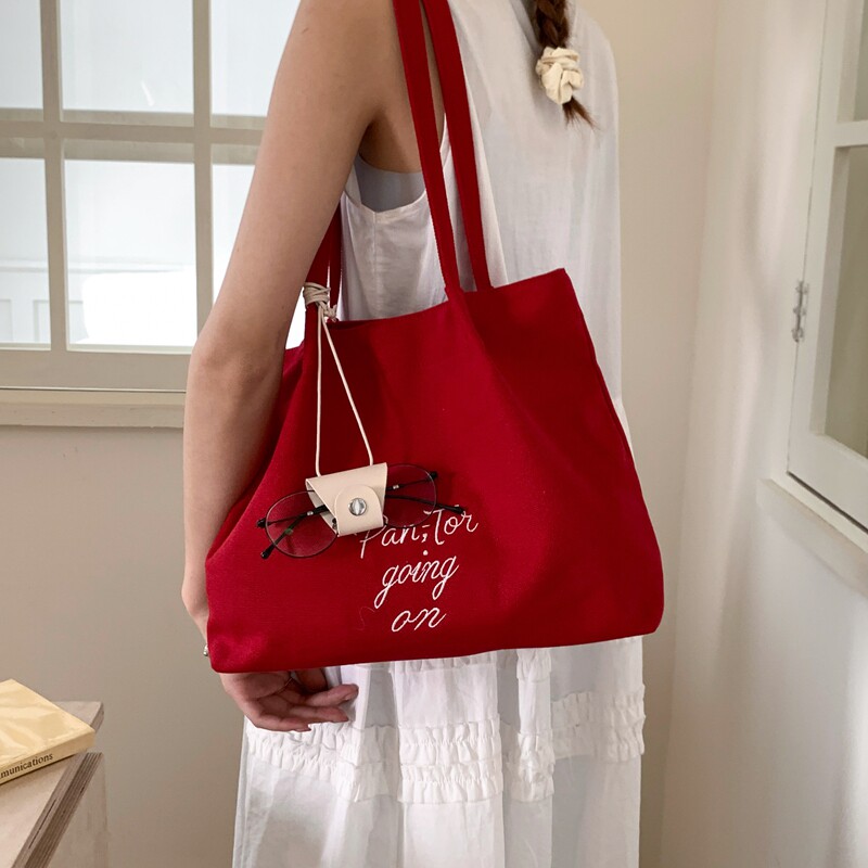 盛夏游行托特包包女2025夏季新款潮大容量红色帆布包韩版单肩大包