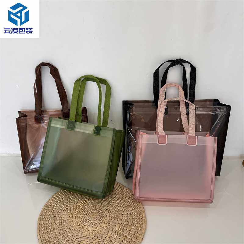 新款直销复合塑料pvc加厚高档透明化礼品服装店用服饰手提袋子包