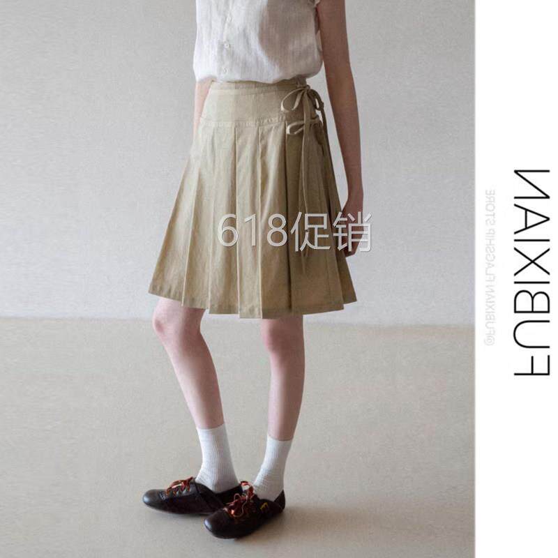 蝴蝶结高腰百褶半身裙女2026夏季卡其设计感气质显瘦通勤a字中裙