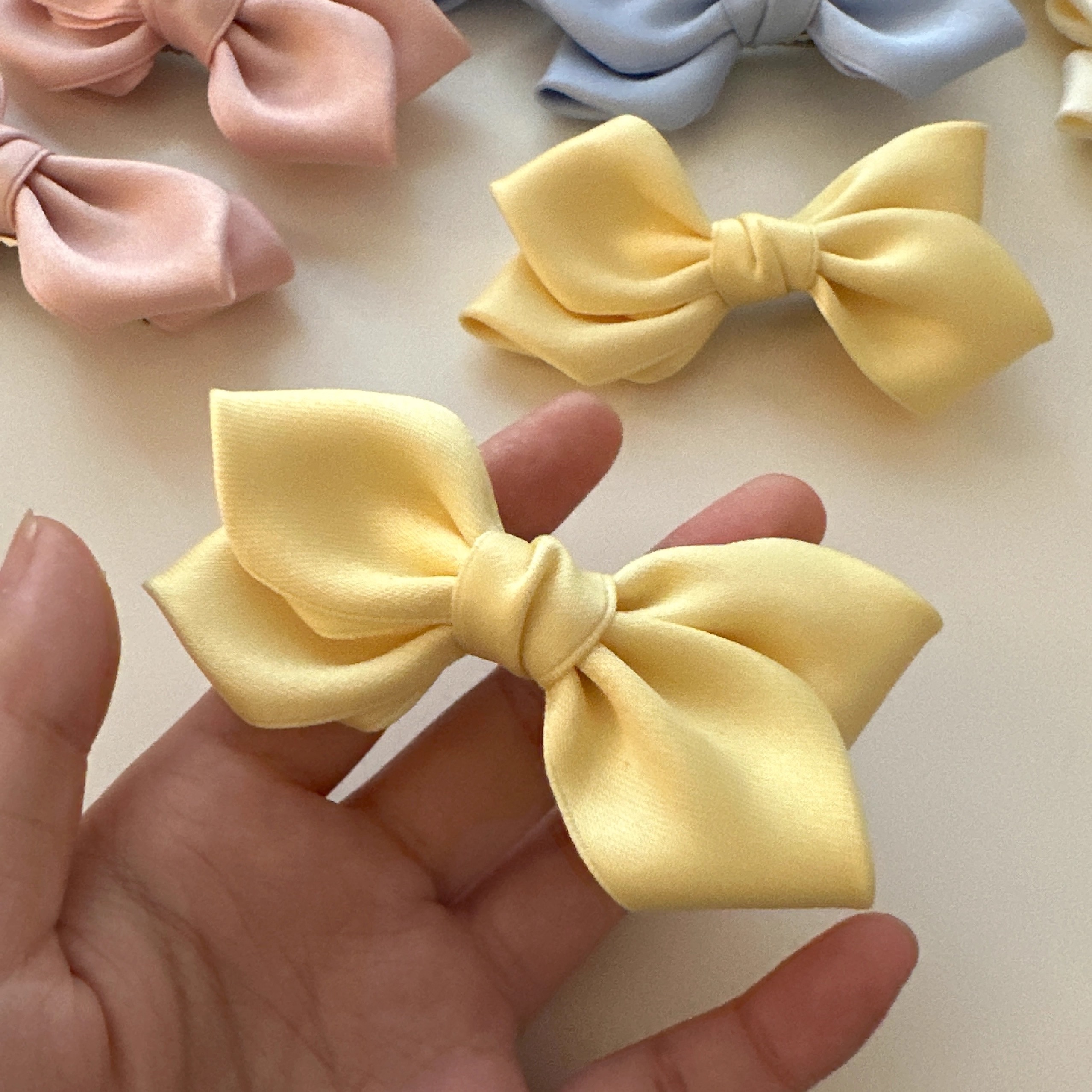 日韩奶油色棉带蝴蝶结发夹