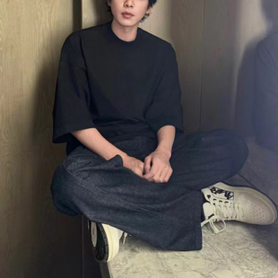 24春夏LEMAIR风格微扭曲侧缝靛蓝色高腰弧形剪裁长裤高级感牛仔裤