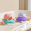 Wind-up toy play in water, pig, hippo