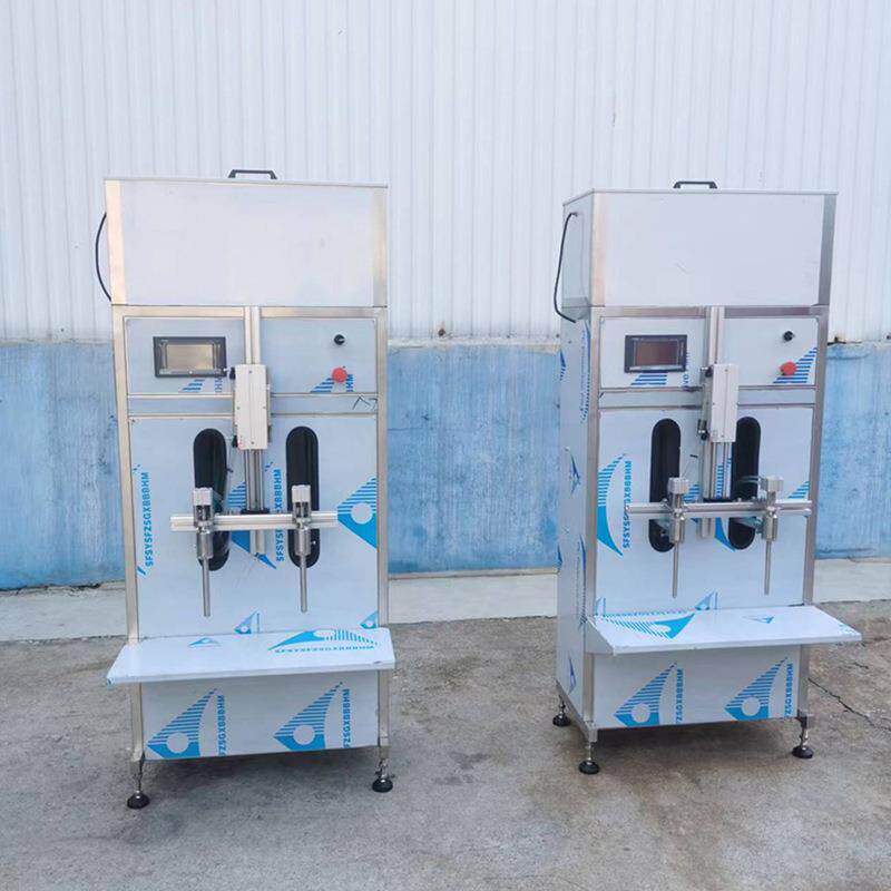 厂家供应双头半自动灌装机白酒饮料双头自流灌装机液体灌装设备