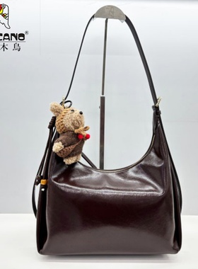 TUCANO/啄木鸟商场同款女包2025新款百搭腋下包高档牛角包TBK6611