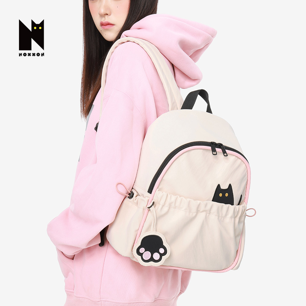 NOXXON通勤白色高质感书包轻便休闲背包超轻量双肩包女旅游轻便